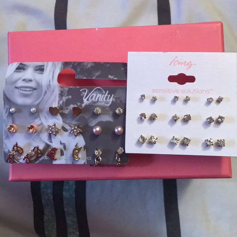full sets of like new earrings